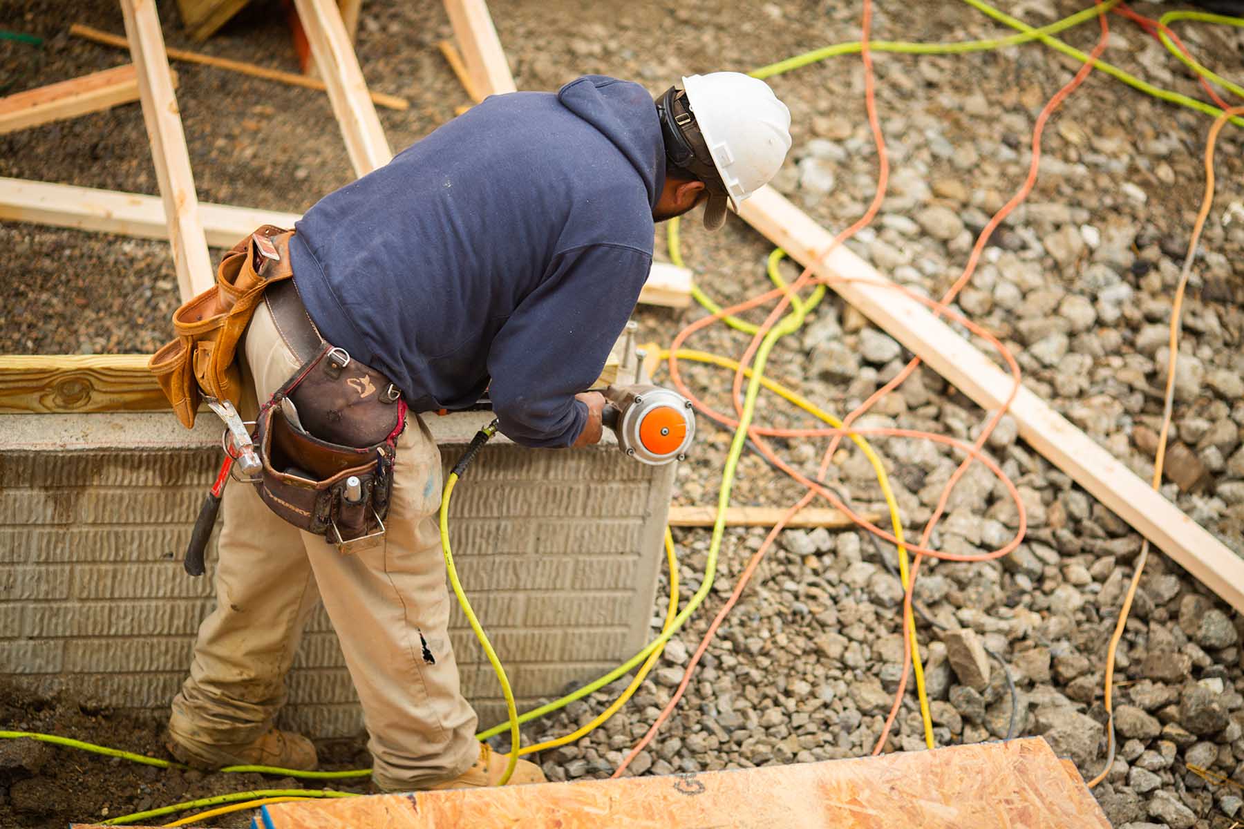 Construction Worker Building Home Foundation