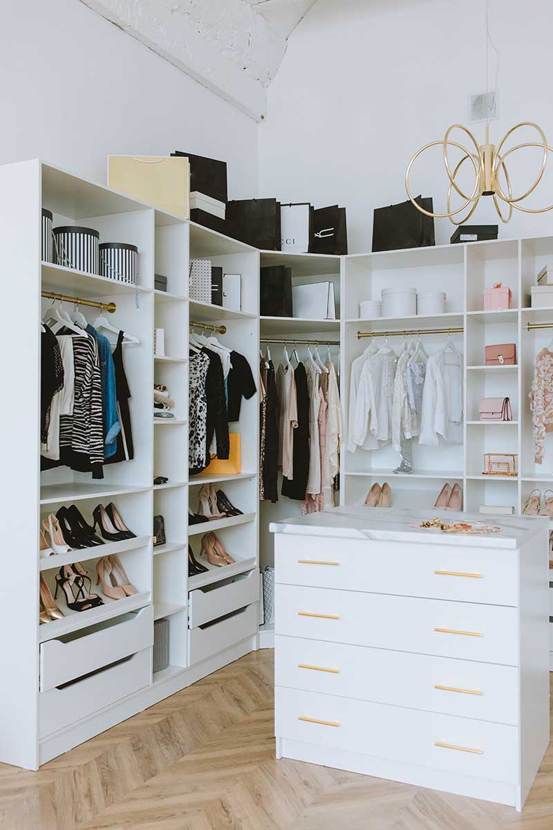 Organized Closet With White Shelves